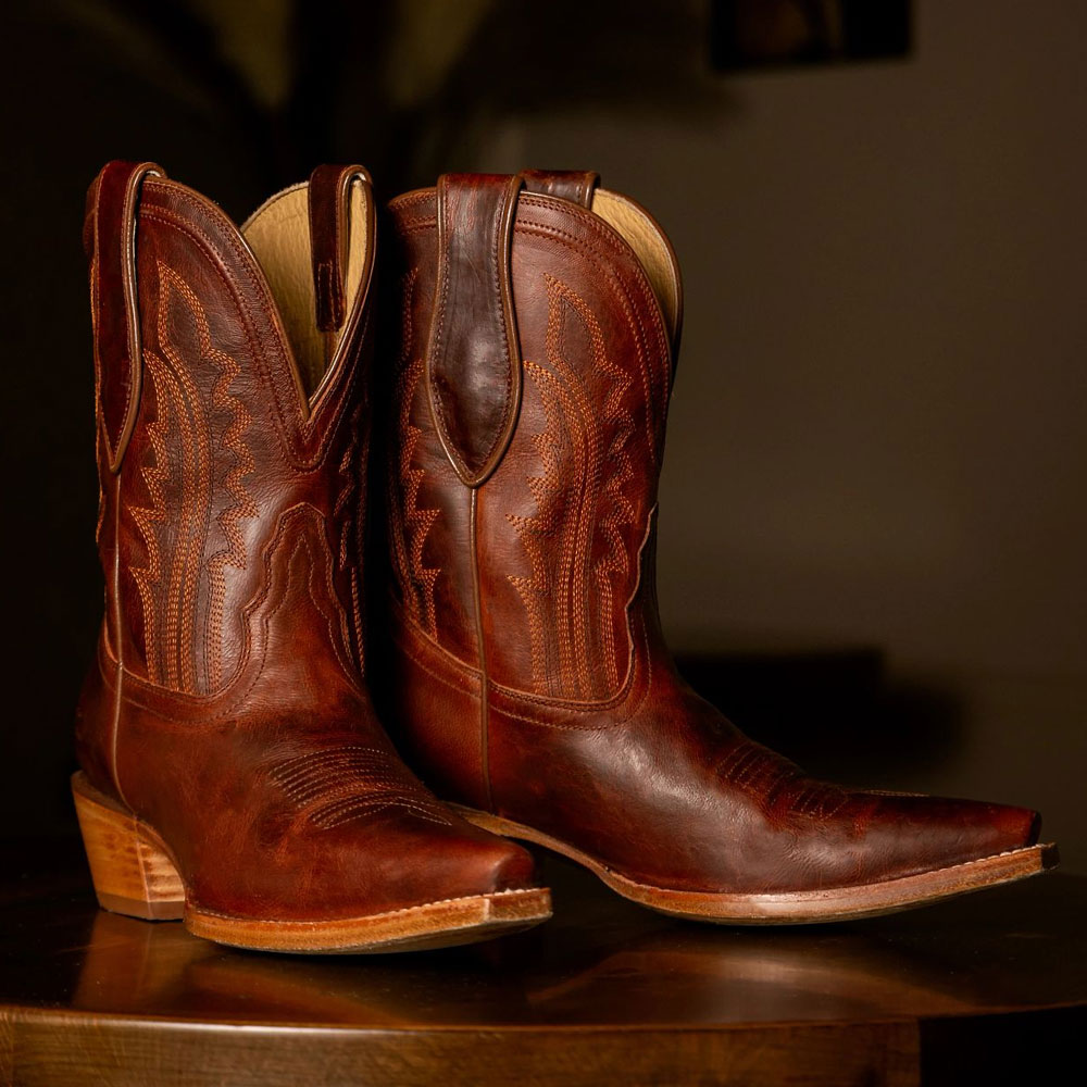 Featuring the Areli 9" western Bootie in brown.